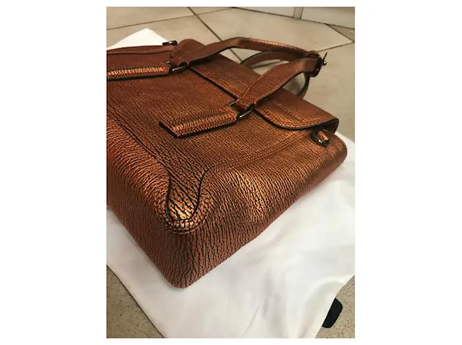 3.1 Phillip Lim Pashli Medio Bronce 