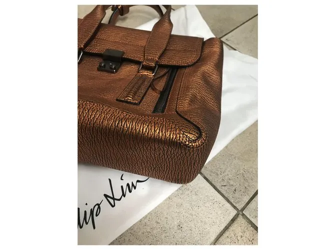 3.1 Phillip Lim Pashli Medio Bronce 