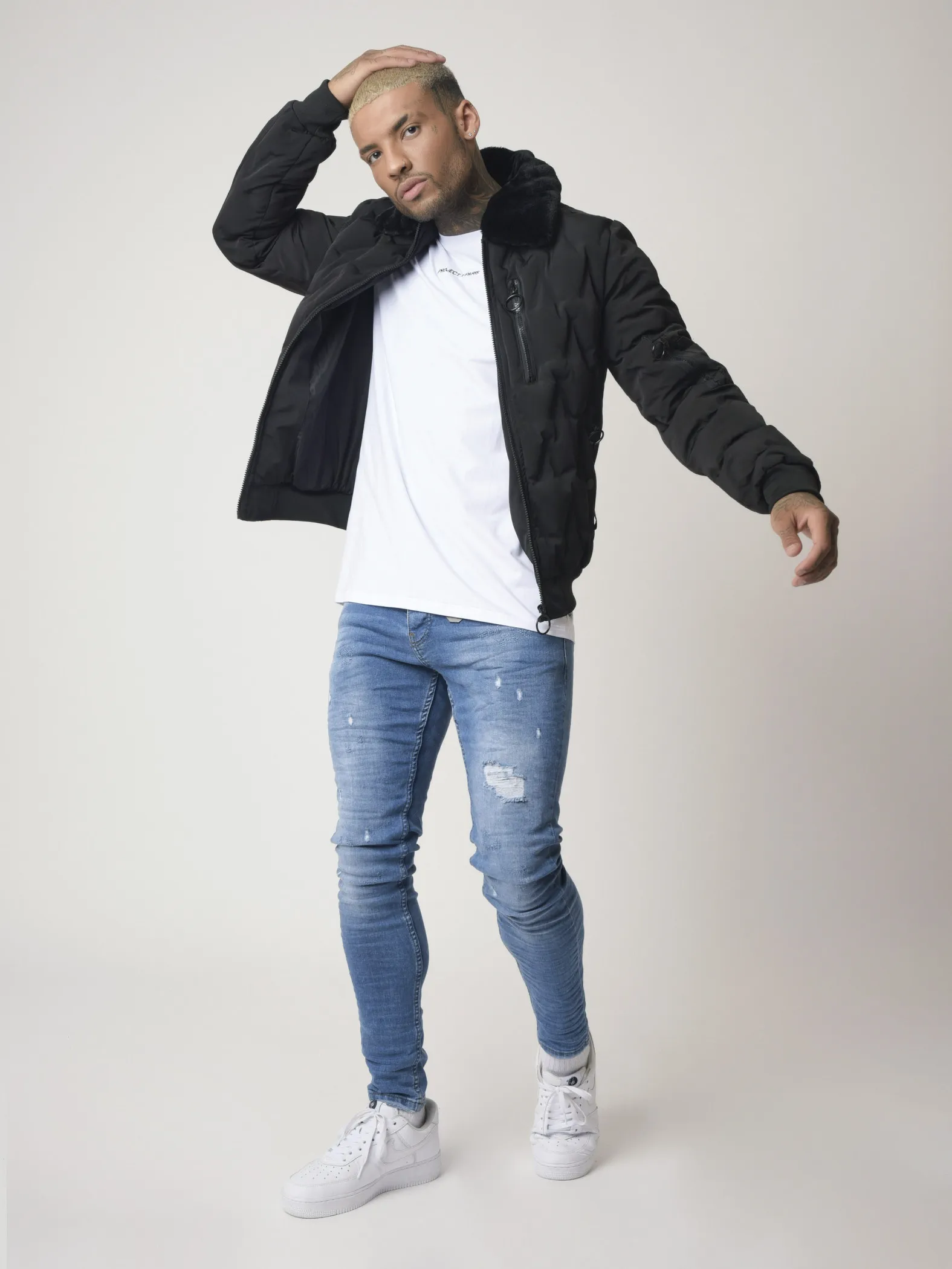 Chaqueta acolchada con cuello de piel