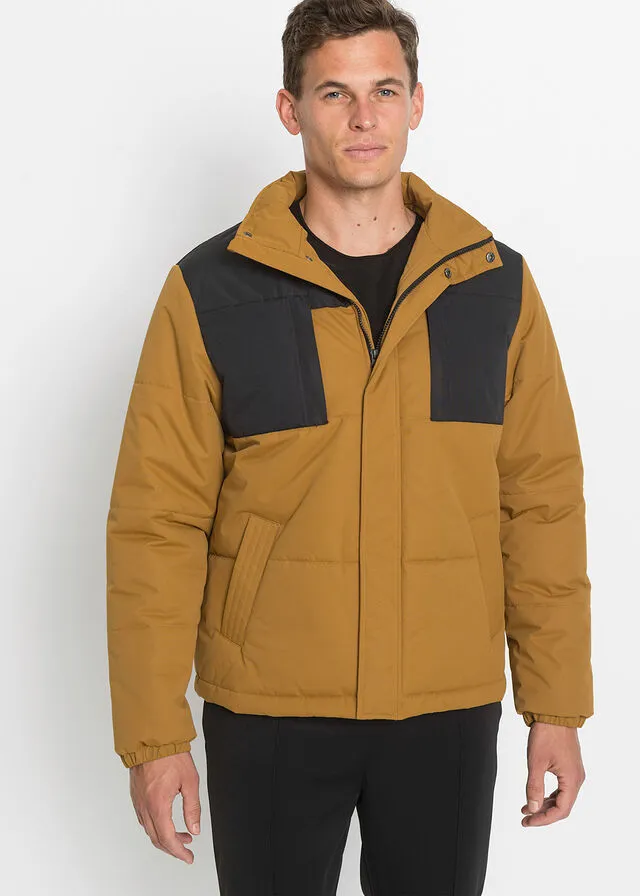CHAQUETA FUNCIONAL DE CORTE HOLGADO MARRóN DORADONEGRO
