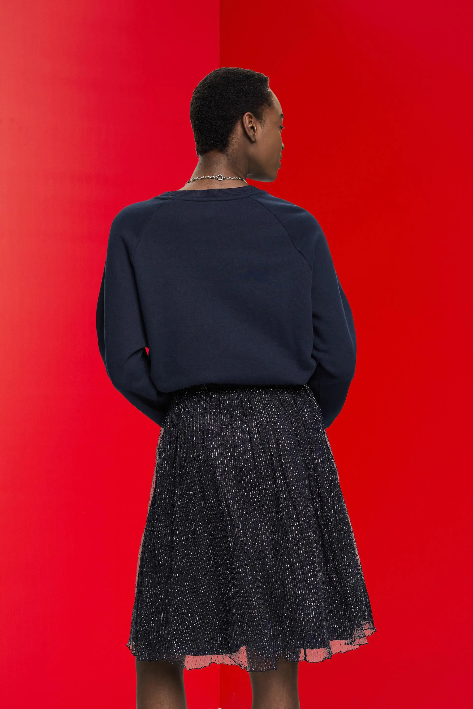 Falda midi con efecto brillante
