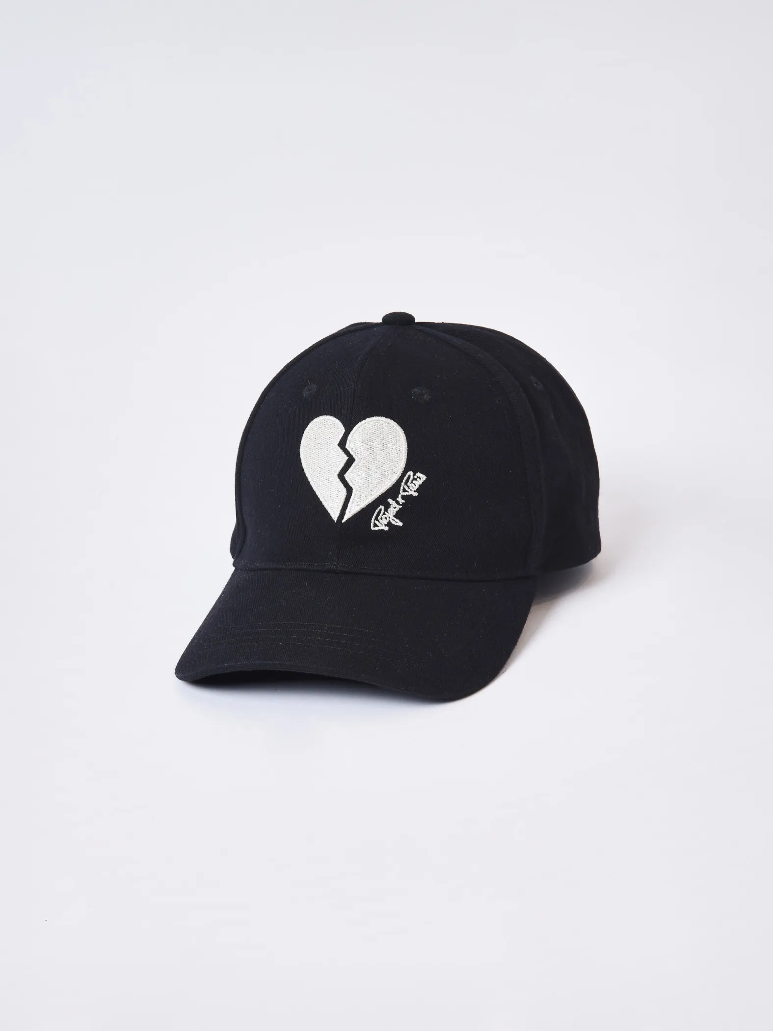 Gorra unisex ajustable con el corazón roto