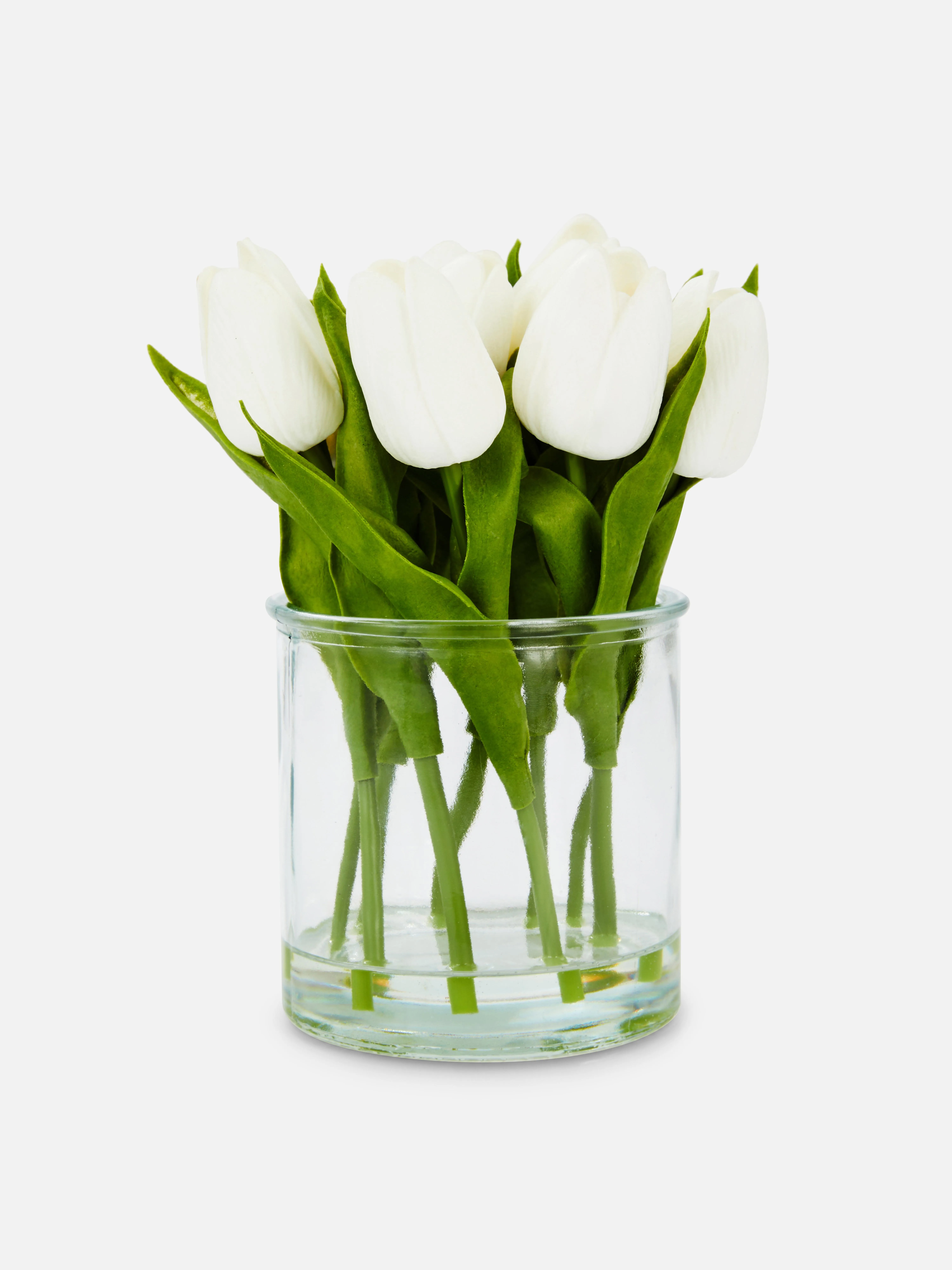 Jarrón de vidrio con tulipanes artificiales