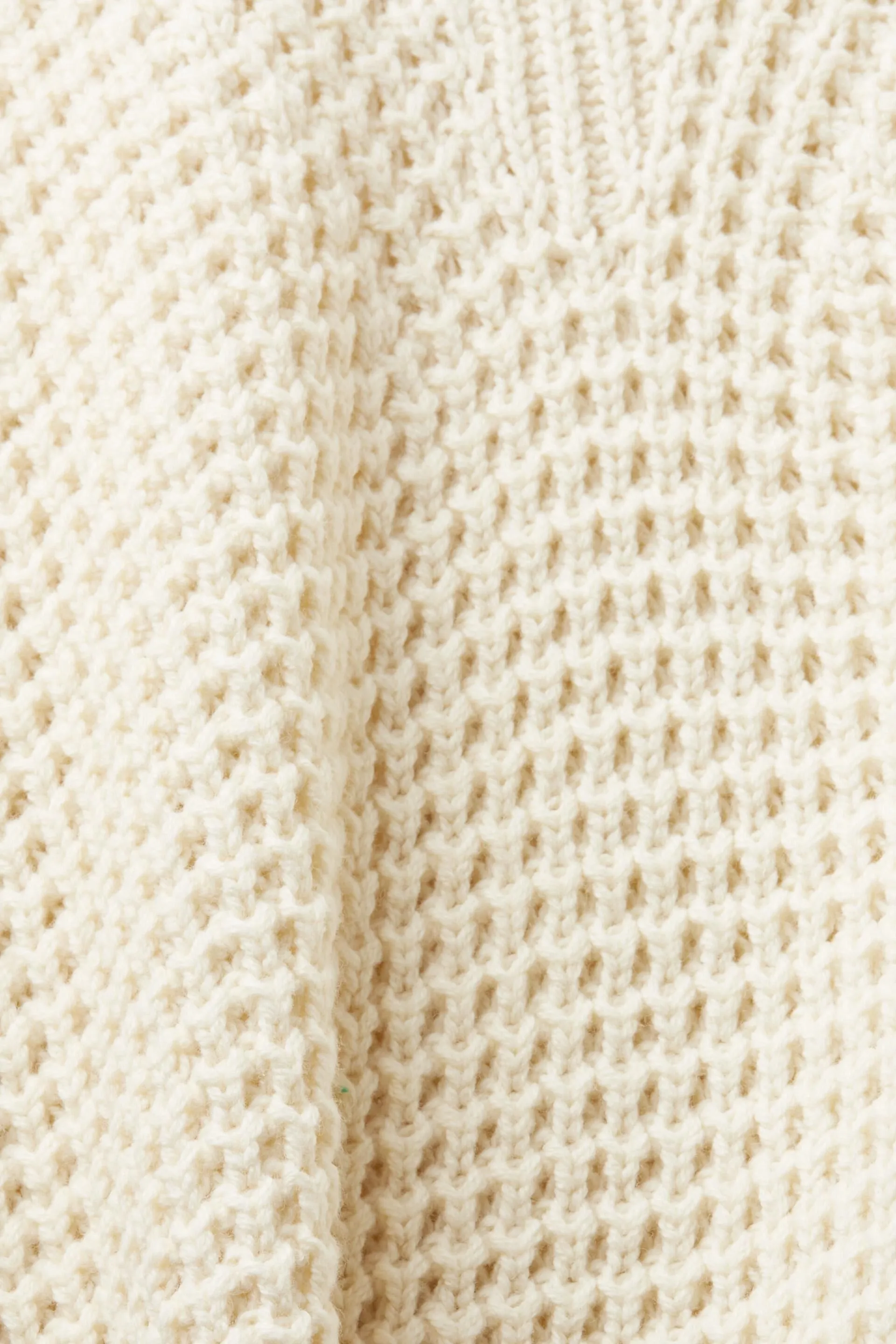 Jersey con cuello alto y corte holgado
