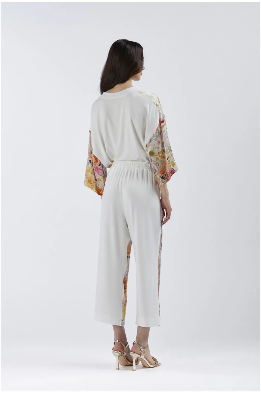 pantalón bimateria con parte delantera estampada flower panel