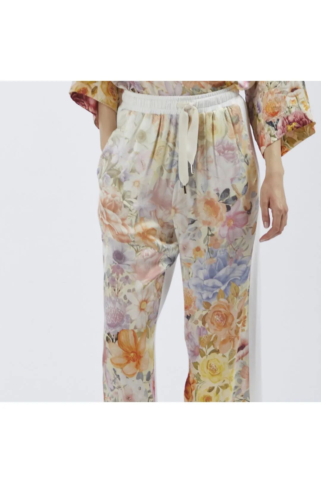 pantalón bimateria con parte delantera estampada flower panel