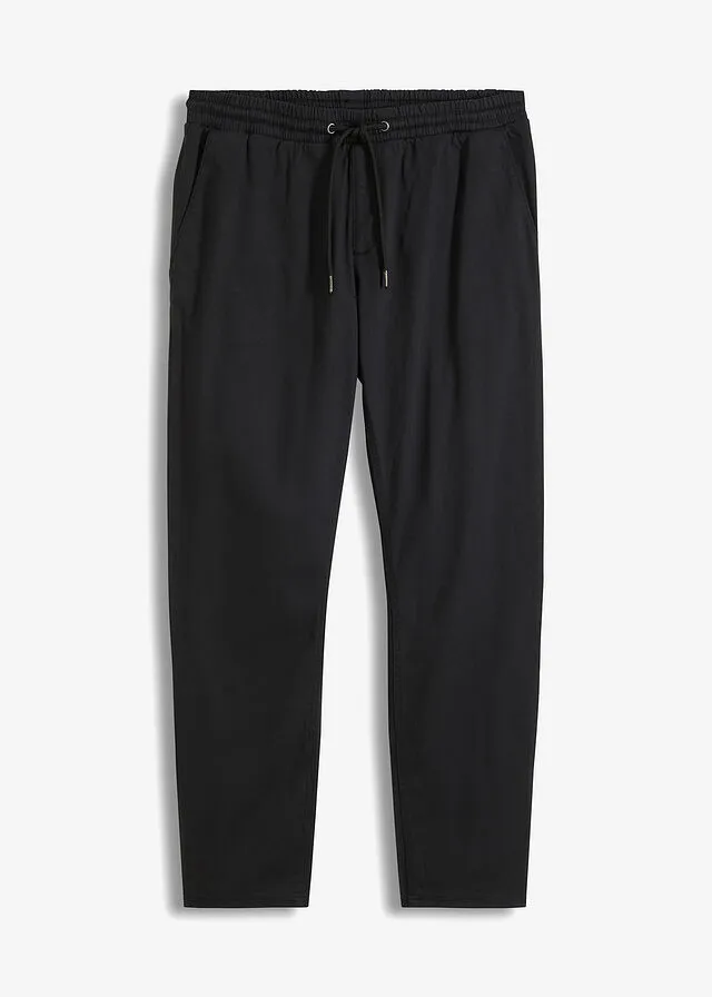 Pantalón chino elástico de corte regular, largo acortado y estilo tapered Negro