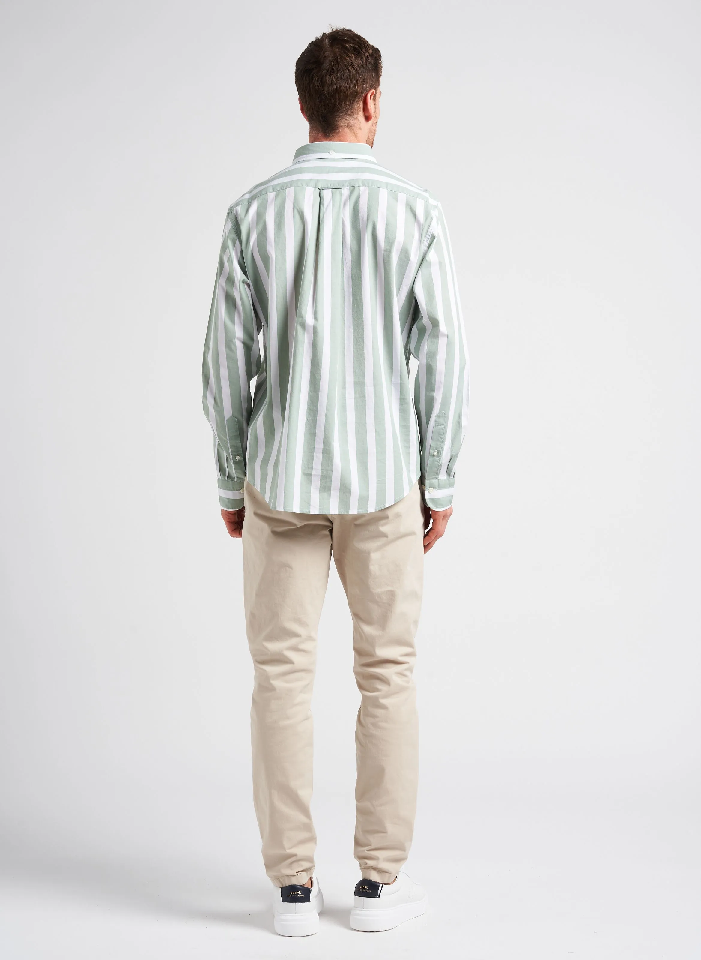 Pantalón chino regular fit de algodón elástico en beige