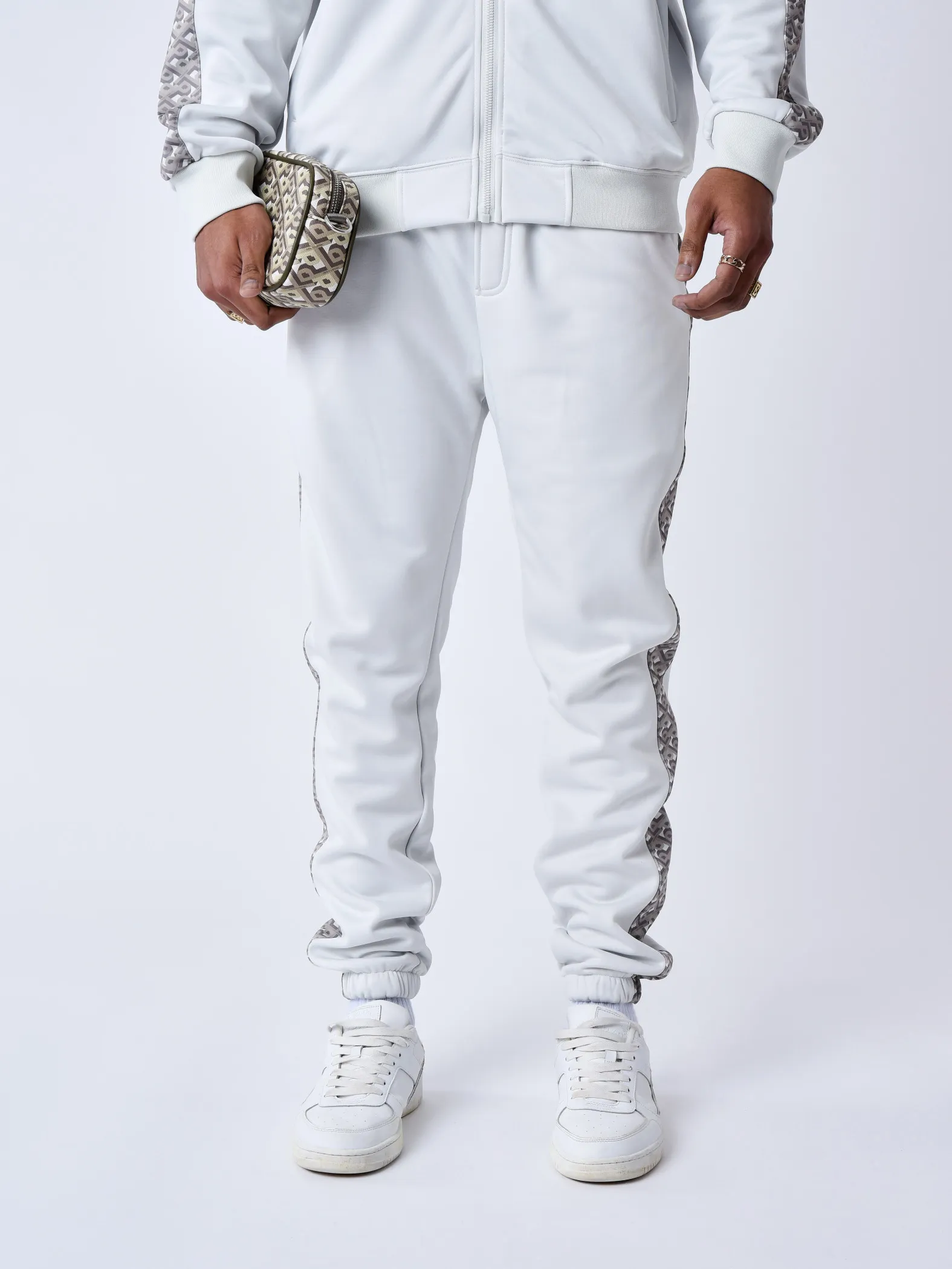 Pantalón de chándal con banda estampada
