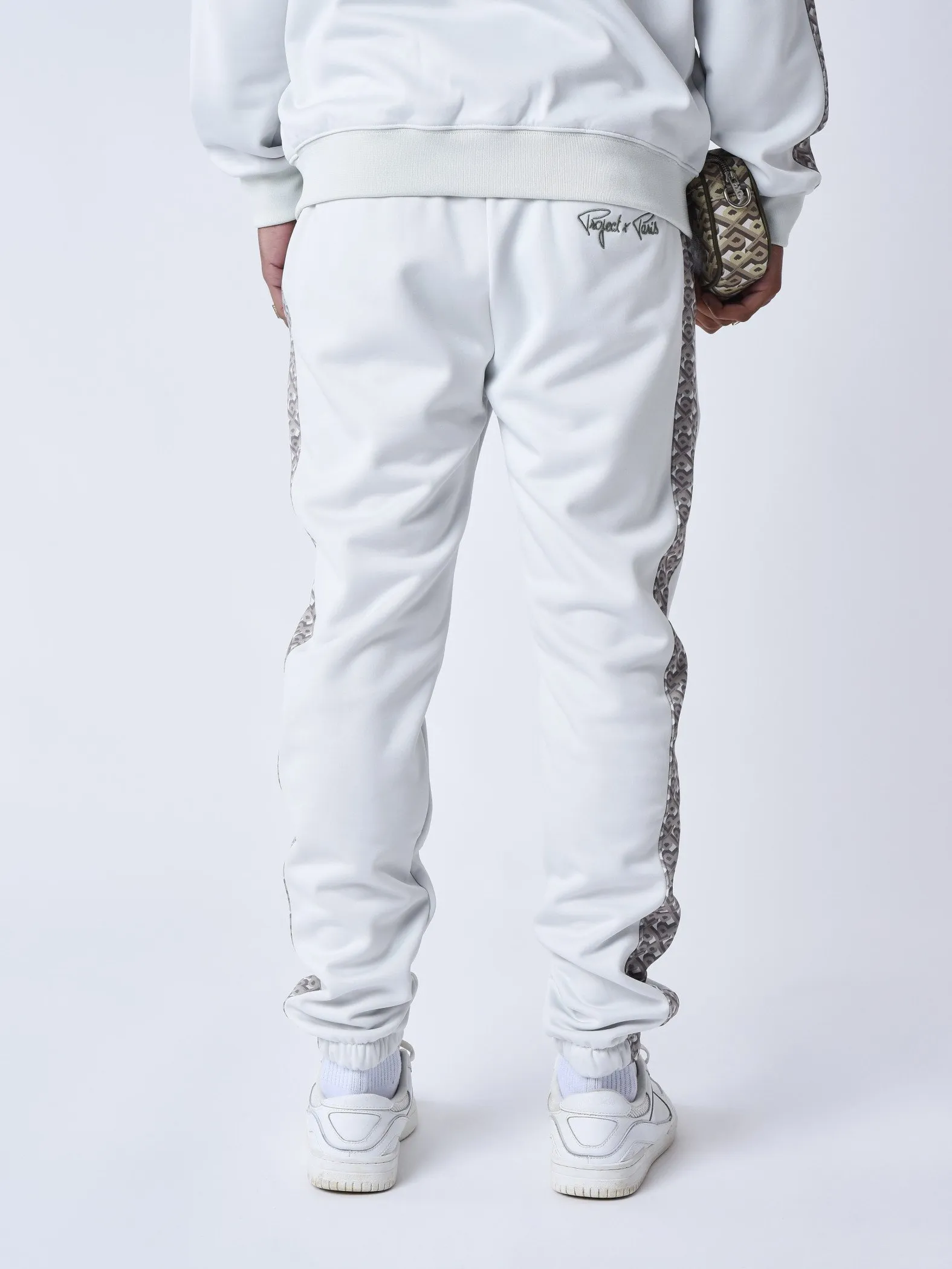 Pantalón de chándal con banda estampada