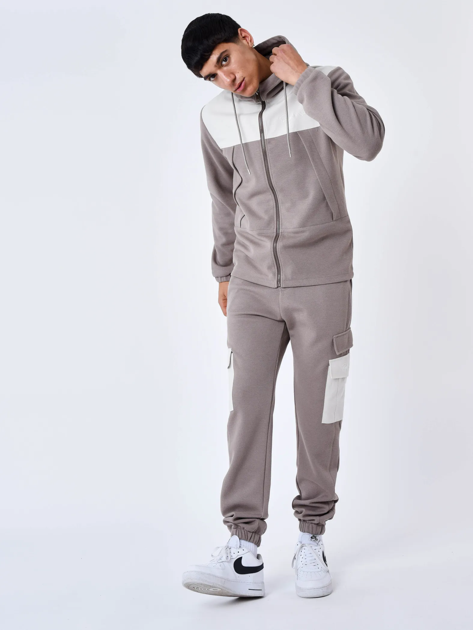 Pantalón de chándal de dos piezas con bolsillos