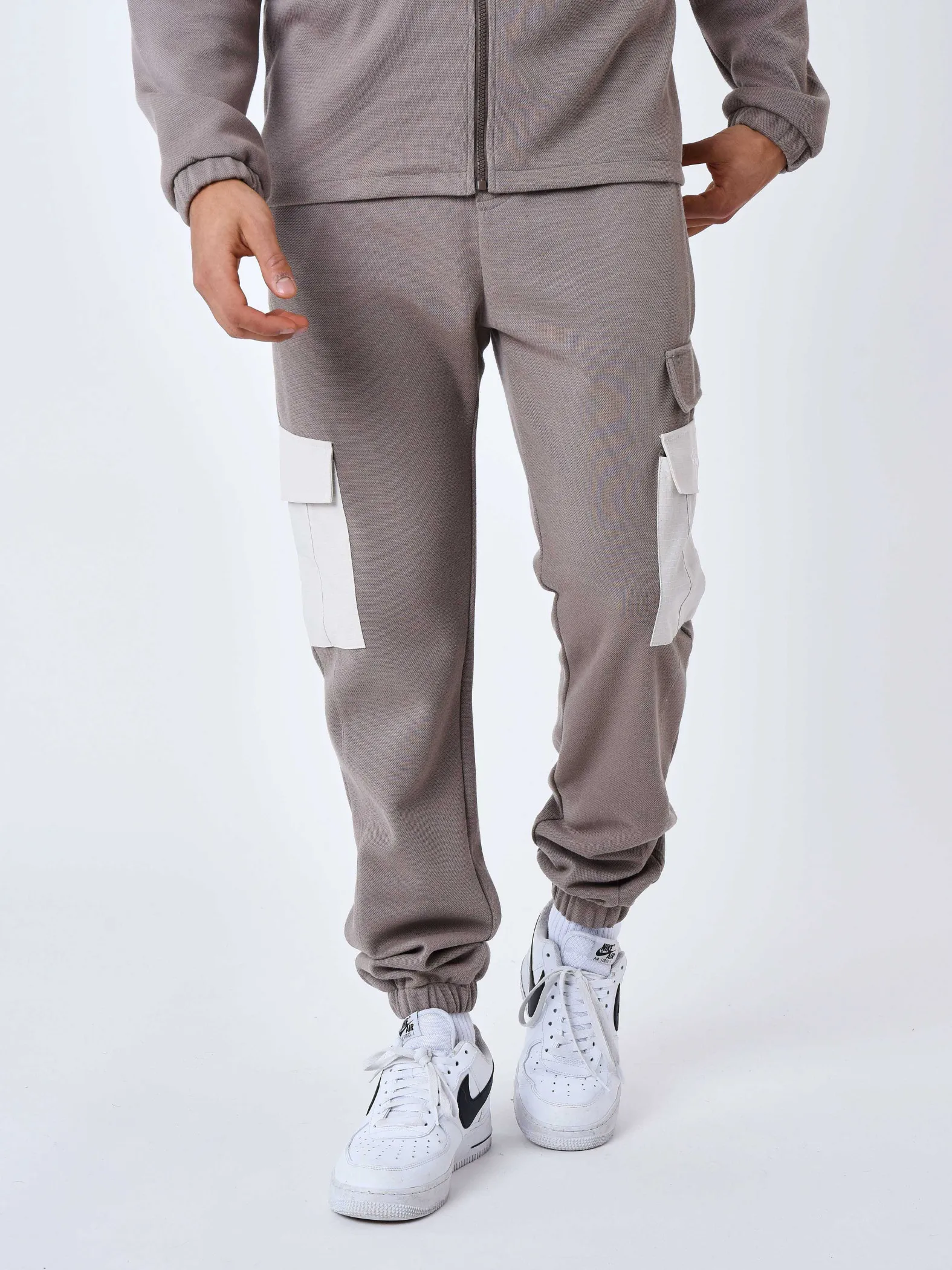Pantalón de chándal de dos piezas con bolsillos