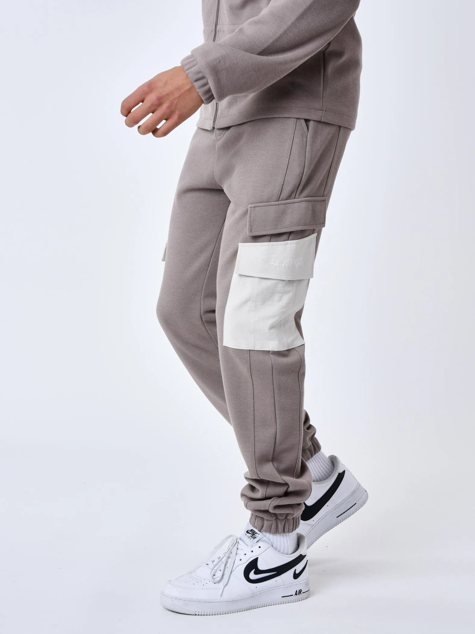 Pantalón de chándal de dos piezas con bolsillos