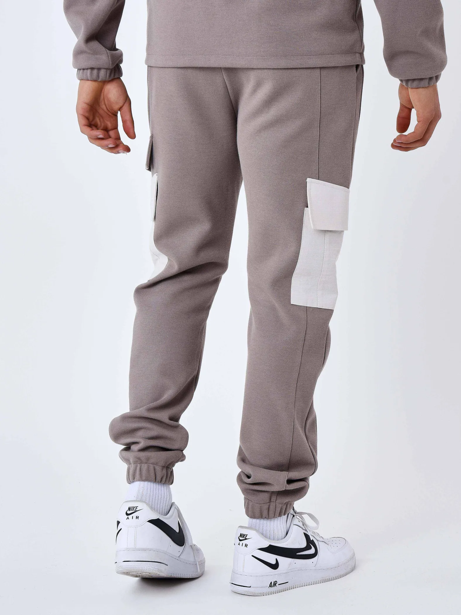 Pantalón de chándal de dos piezas con bolsillos