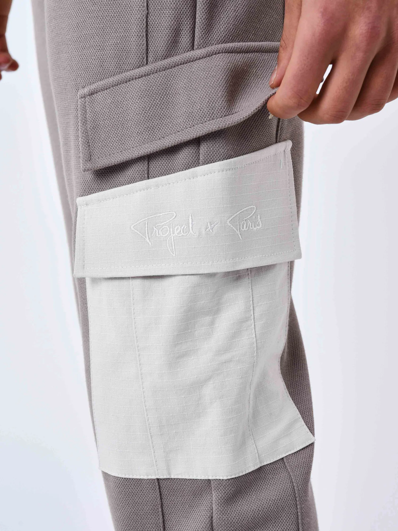 Pantalón de chándal de dos piezas con bolsillos