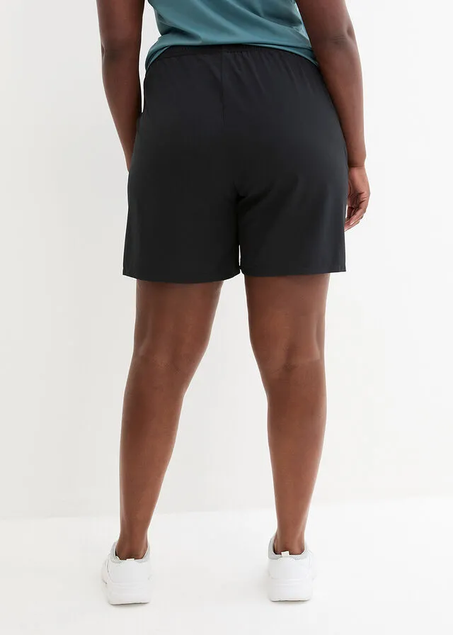 Pantalón deportivo de secado rápido con bolsillos con cremallera, hasta el tobillo Rosa
