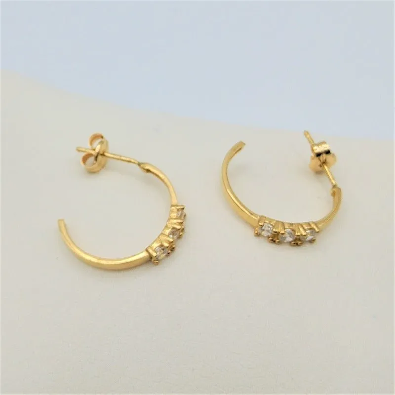 Pendientes oro 18k medio aro pequeo circonita