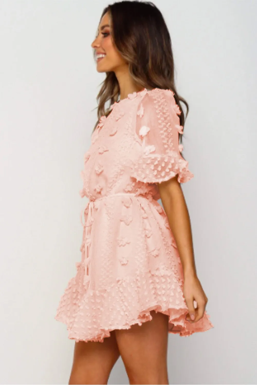 Vestido mini rosa con cuello redondo
