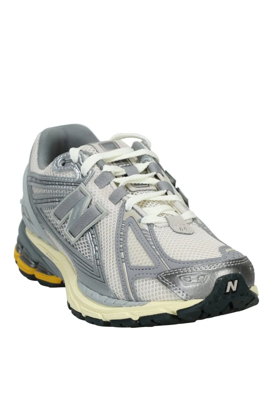 Zapatillas grises mix con detalle amarillo 